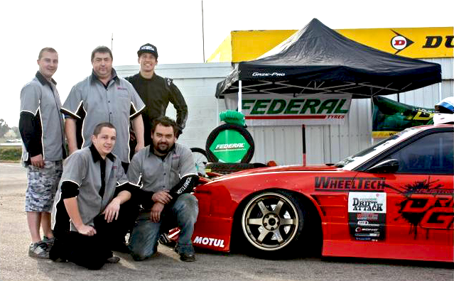 Petrie & Team Wheeltech Nigel Petrie & Team Wheeltech bask in the glow of a job well done.